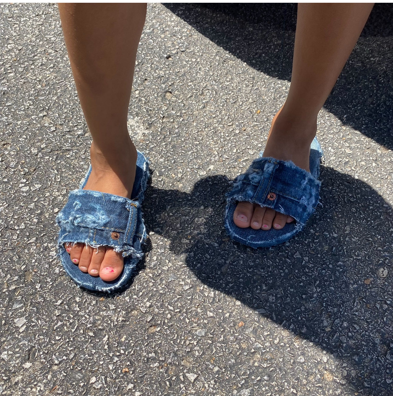 Distressed denim slides
